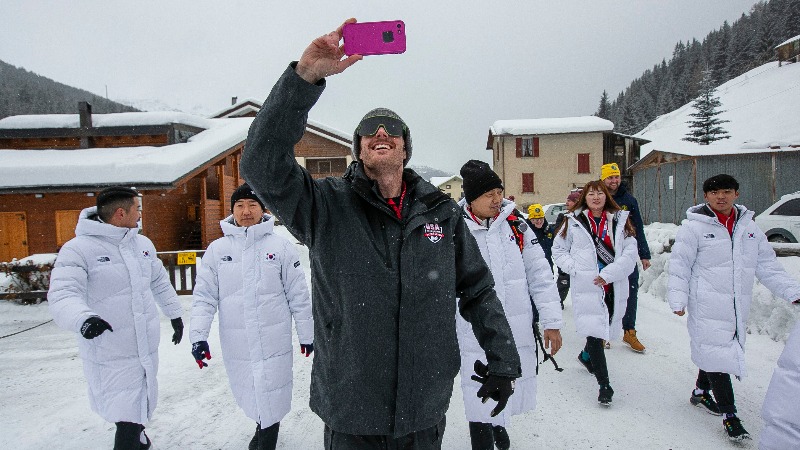 Sean with Koreans behind him