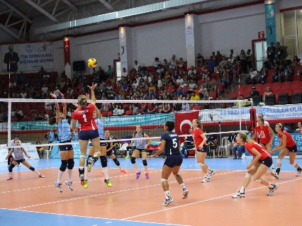 Kali Leann Frowick (1) dink a volleyball against Ukraine.